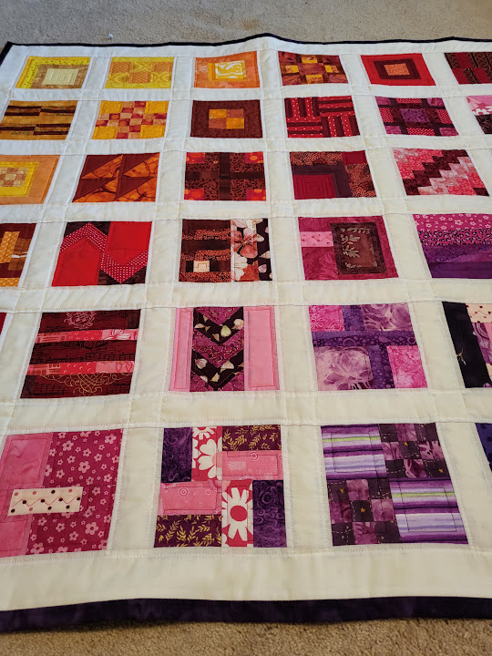 Rose Window: pieced cotton in rose, red, gold, and ivory by CULCITA by Keri